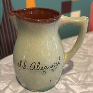 A.S. Abeqweit Handcrafted Ceramic Pitcher - Small chip in glaze